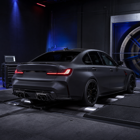 BMW S58 custom calibration service with a performance sedan on a chassis dyno